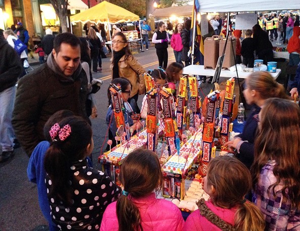 Children admiring a candy version of the New NY Bridge at a recent Halloween event.